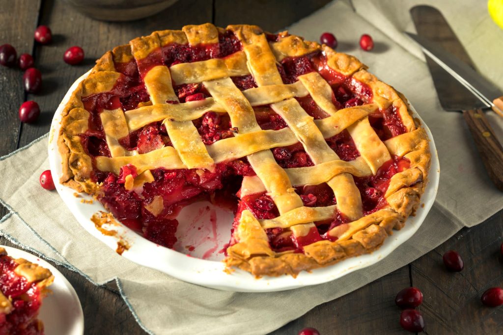 Picture of cherry pie with slice eaten