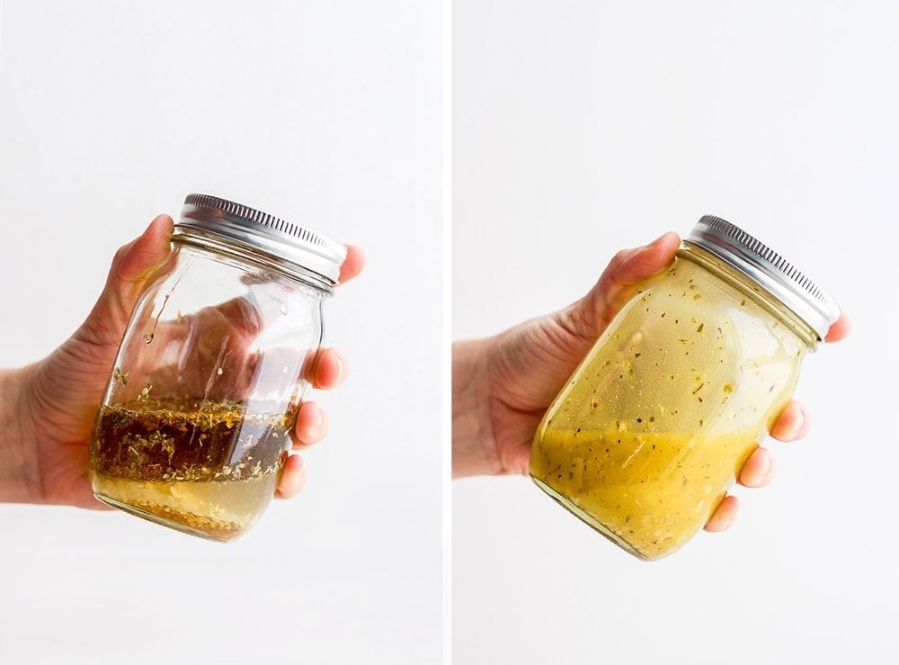 Shaking greek salad dressing up in a jar