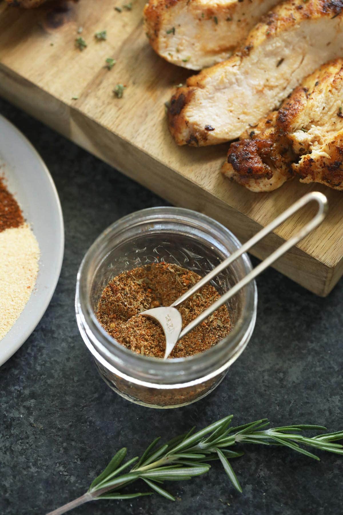 All purpose chicken seasoning in a small jar.