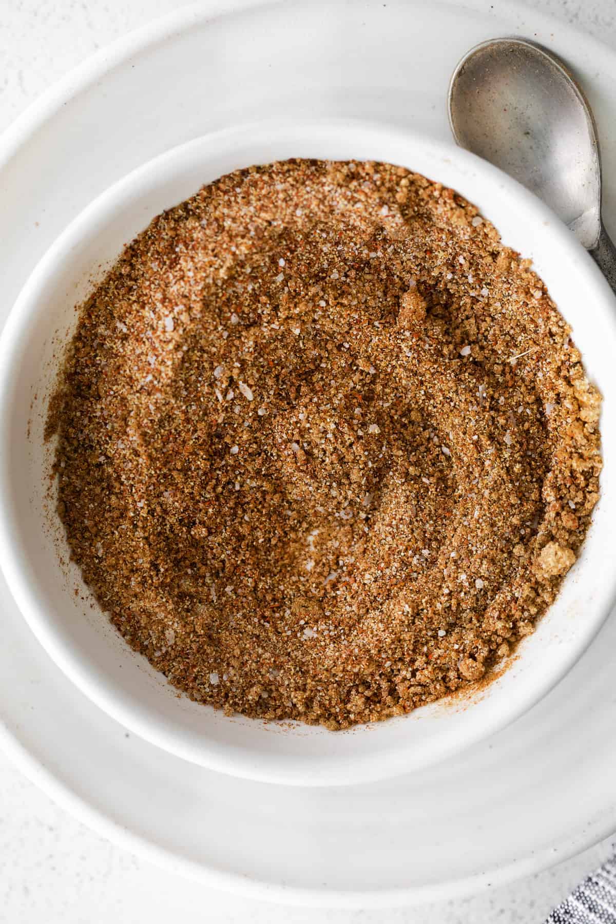This super flavorful steak taco seasoning comes together in just 7 ingredients you likely have on hand in your spice cupboard already. ingredients for steak taco seasoning in a bowl mixed together