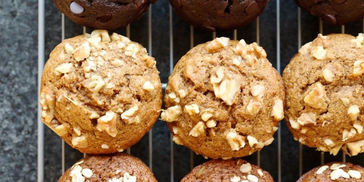 These banana nut muffins are made with mashed banana, walnuts, ground cinnamon, and vanilla extract making them slightly spicy, good-for-you, and a great breakfast muffin recipe! Healthy Banana Nut Muffins