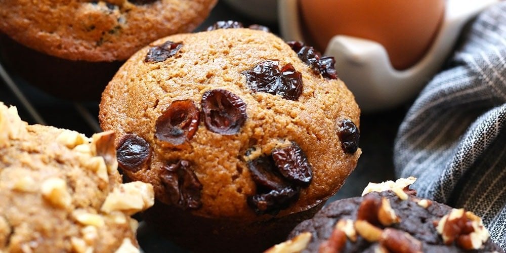 With just a little bit of orange extract, orange zest, and dried cranberries, you're going to get the most delicious cranberry orange muffins out there. Bonus...they're healthy and 100% whole grain! Cranberry Orange Muffins