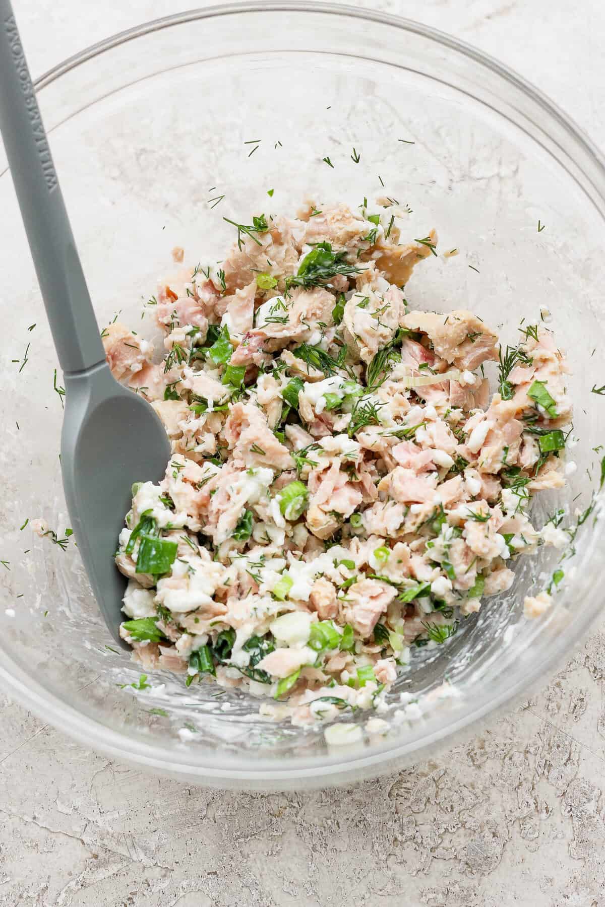 cottage cheese tuna salad mixed in glass bowl