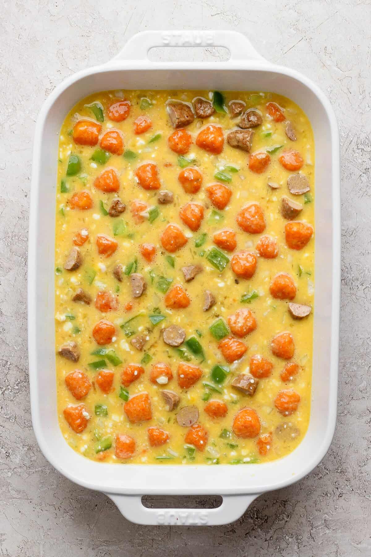 sweet potato breakfast casserole mixed together and ready to bake