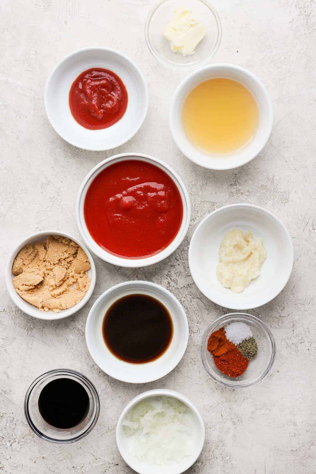 homemade BBQ sauce ingredients in bowls ready to be mixed together.