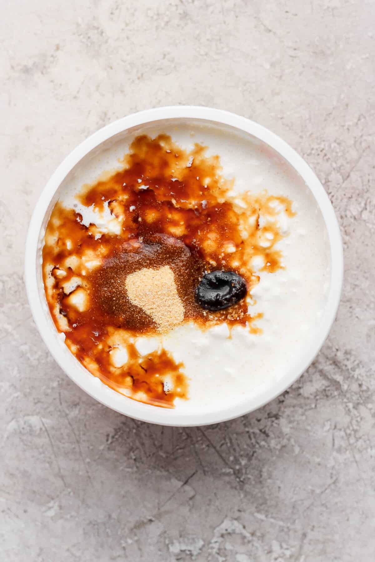 Cottage cheese topped with Worcestershire sauce, beef broth concentrate, and garlic powder before blending.