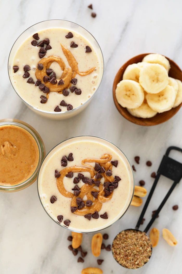 Creamy peanut butter banana smoothie in a glass